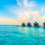Beautiful tropical Maldives resort hotel and island with beach and sea on sky for holiday vacation background concept -Boost up color Processing